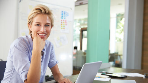 Portrait Of Businesswoman Working In Creative Office